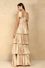 METALLIC LAYERED EVENING DRESS WITH BOW TIE SHOULDER